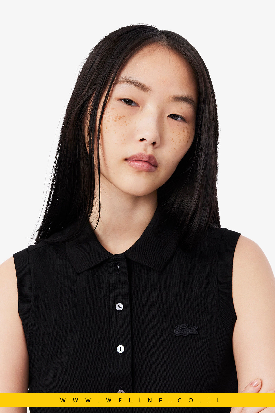 פולו לנשים ללא שרוולים בגזרת Slim – שחור – Lacoste