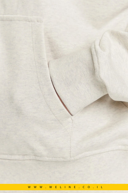 קפוצ'ון נשים Calvin Klein Jeans – דגם Monologo בצבע בז' מלנז' עם רוכסן