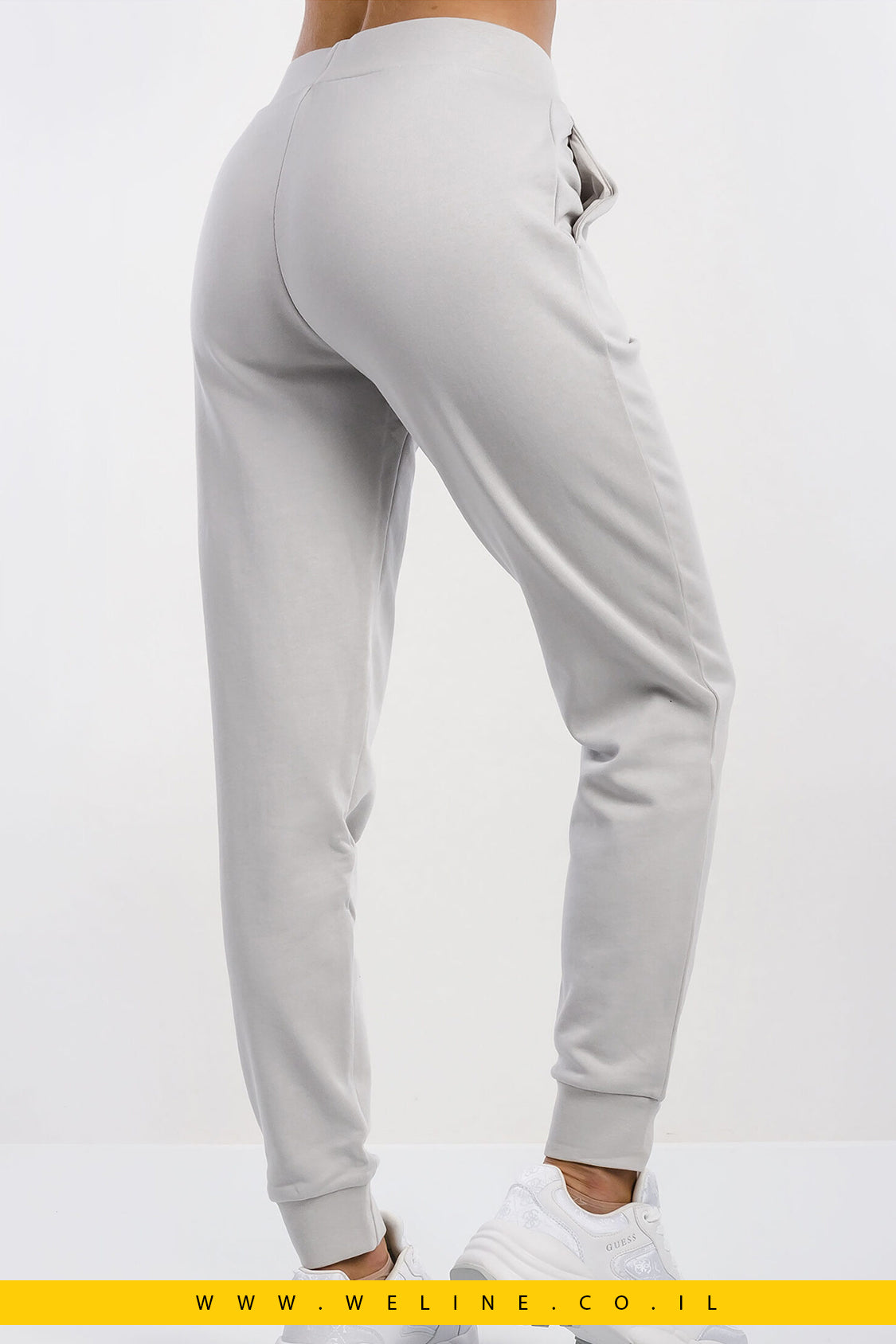 חליפת טרנינג EA7 לנשים בצבע אפור – קפוצ’ון עם לוגו קריסטלים