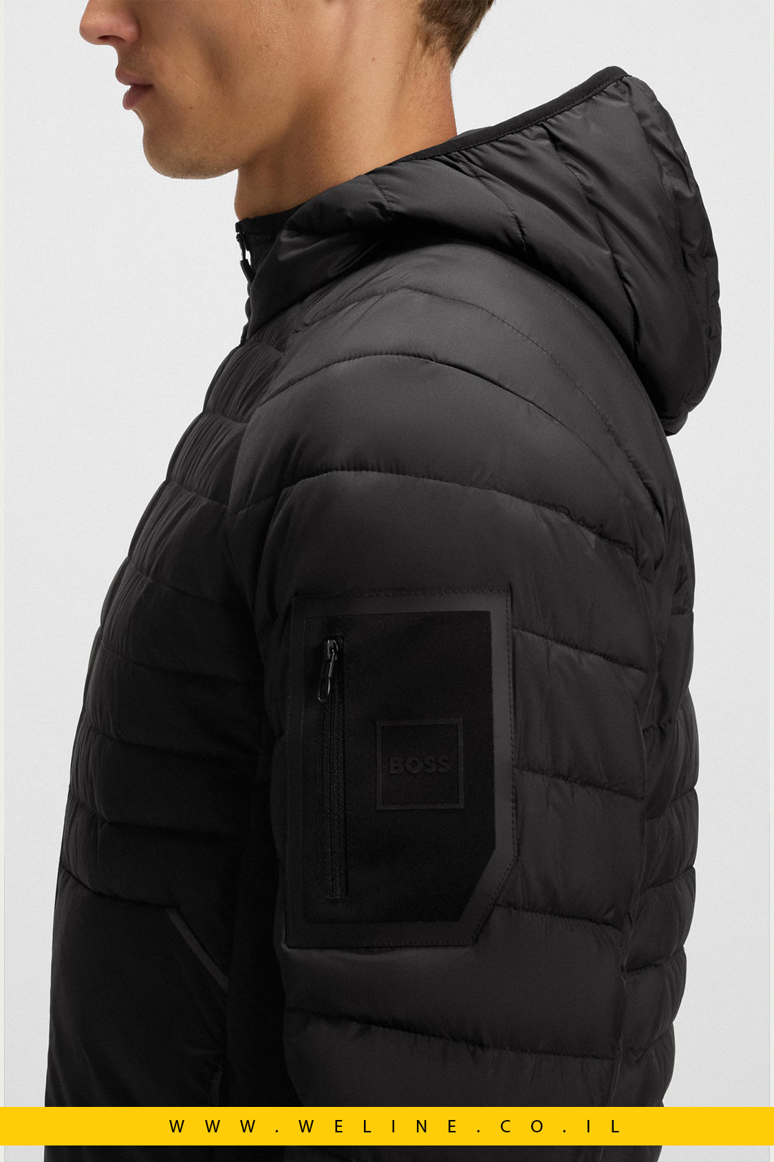 מעיל קפוצ'ון דוחה מים עם פרטי רפלקטור – BOSS Urbanex