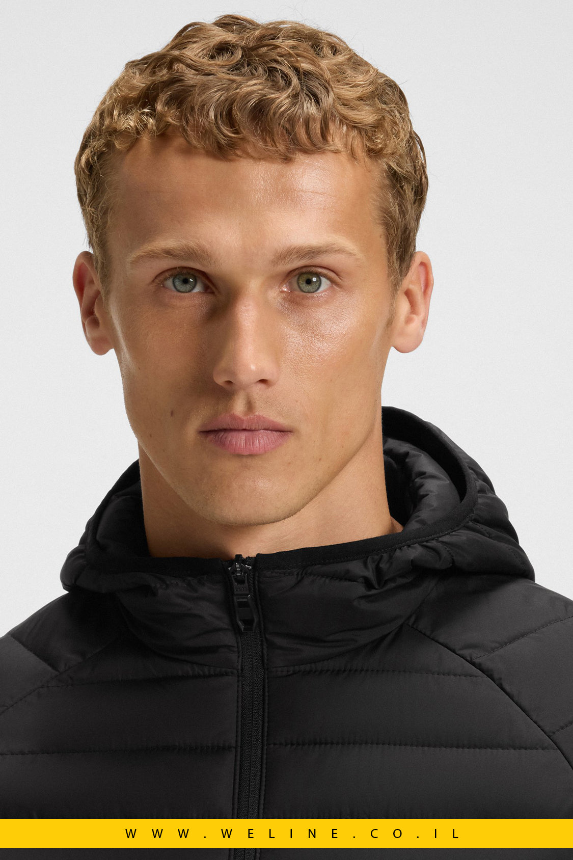 מעיל קפוצ'ון דוחה מים עם פרטי רפלקטור – BOSS Urbanex