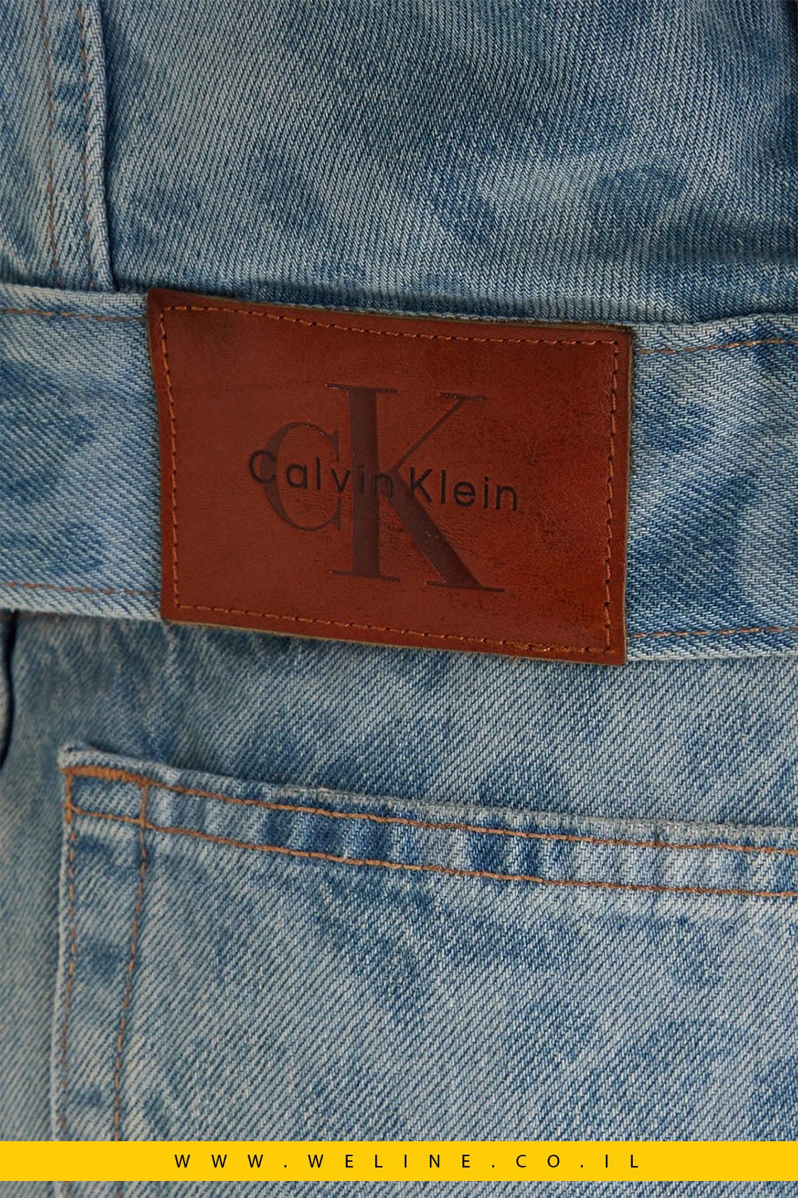 כותרת ג’קט ג’ינס נשים 90s Trucker AOP – Calvin Klein | צבע תכלת Lt Playbill - WELINE.CO.IL