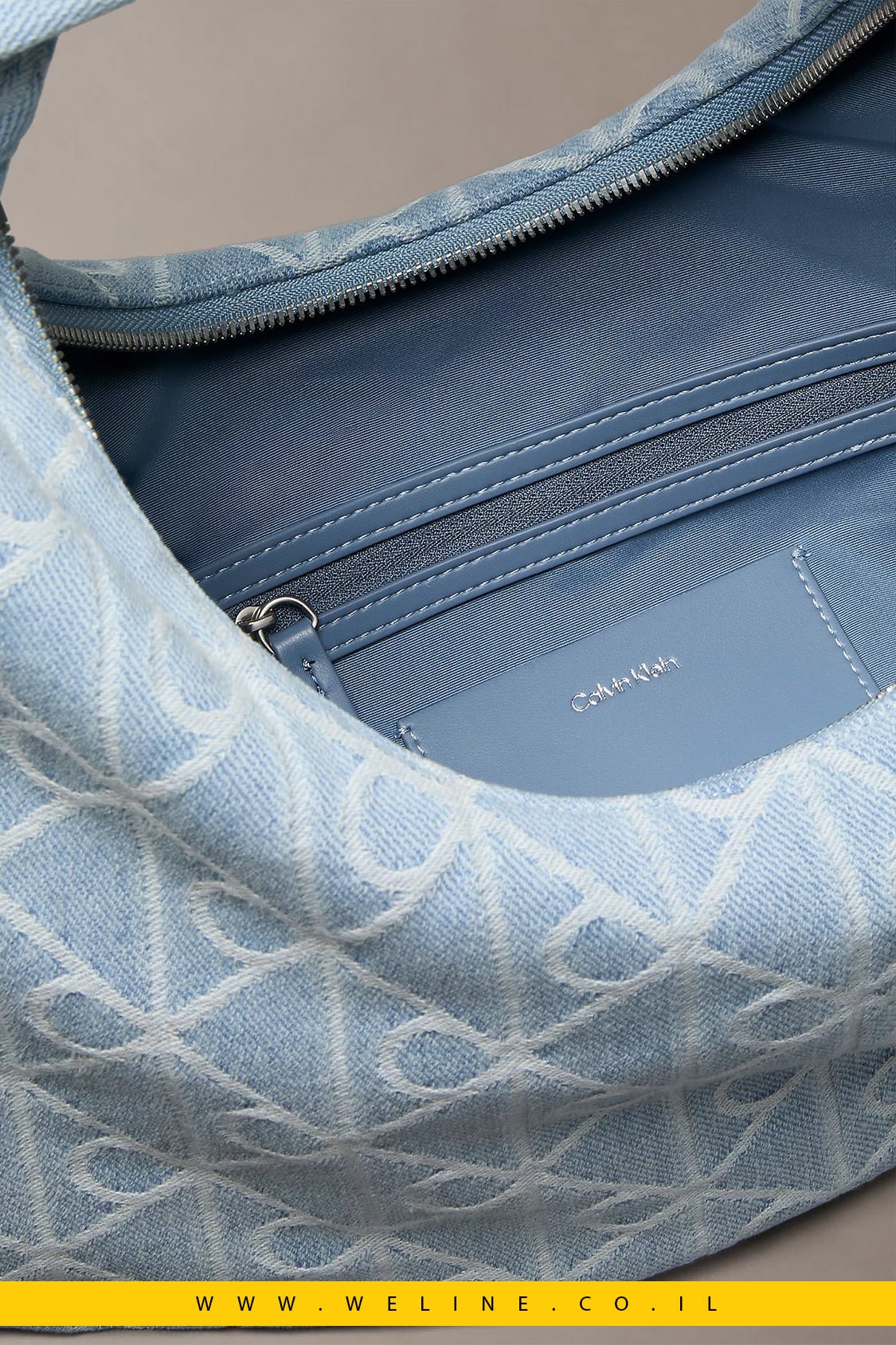 תיק כתף Calvin Klein Allover Emblem Logo Denim Crescent Bag - WELINE.CO.IL