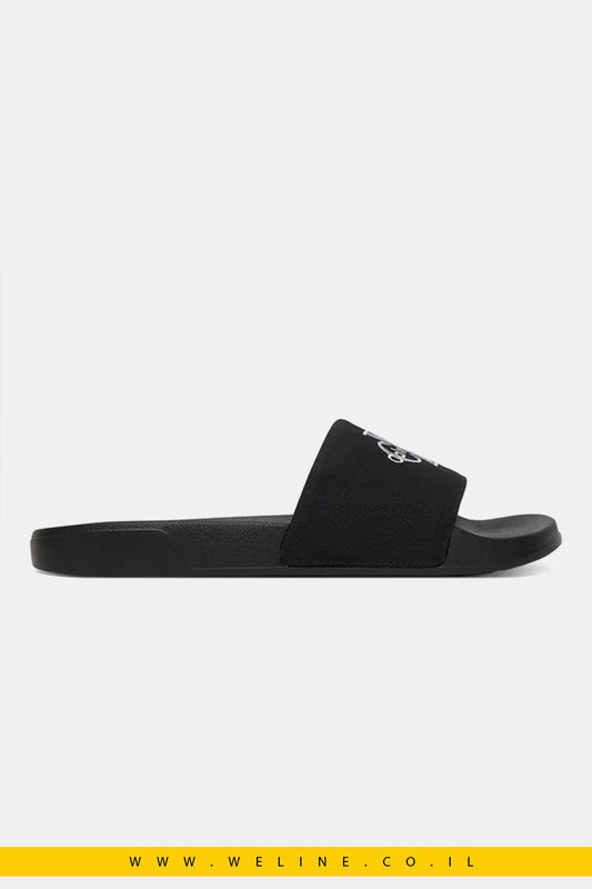 כפכפי סלייד נשים Calvin Klein Canvas Contoured – צבע שחור/לבנדר עדין - WELINE.CO.IL