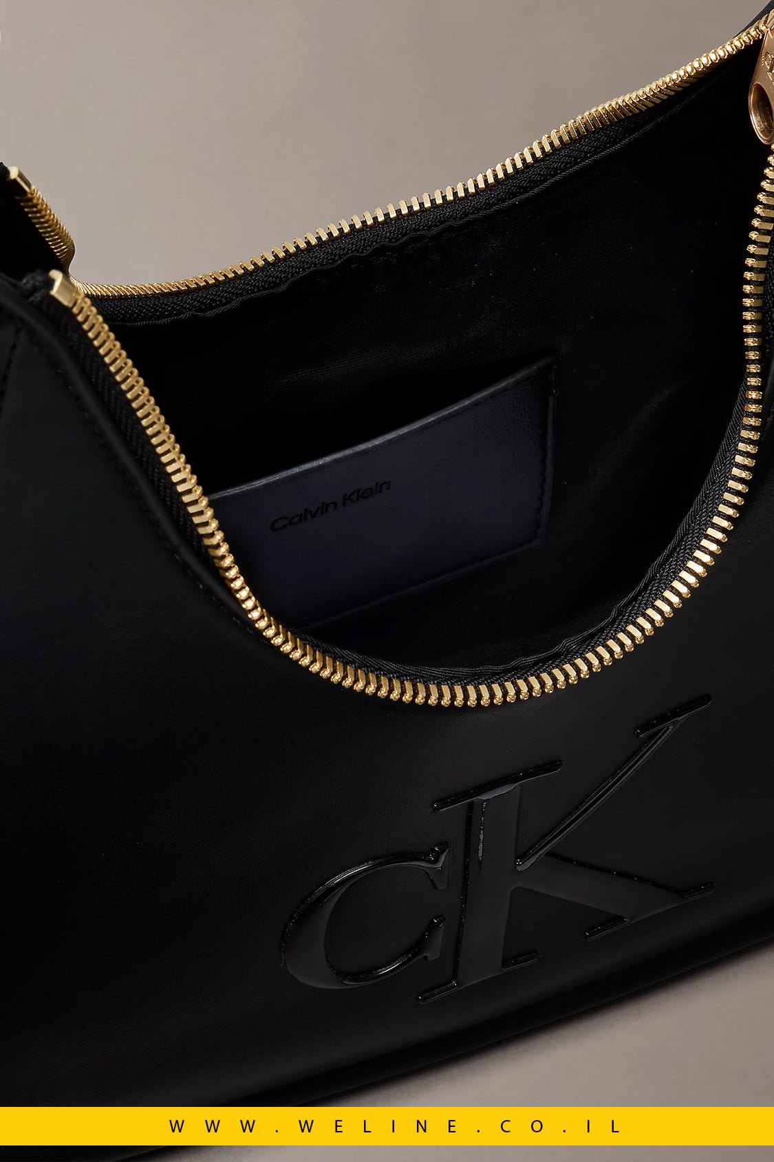 תיק נשים Calvin Klein Embossed Monogram Crescent Bag - WELINE.CO.IL
