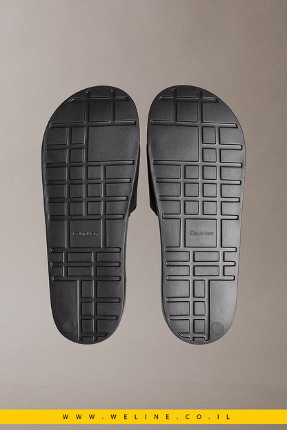 כפכפי סלייד גברים Calvin Klein Nemo Canvas Contoured – צבע שחור מלא (Triple Black) - WELINE.CO.IL