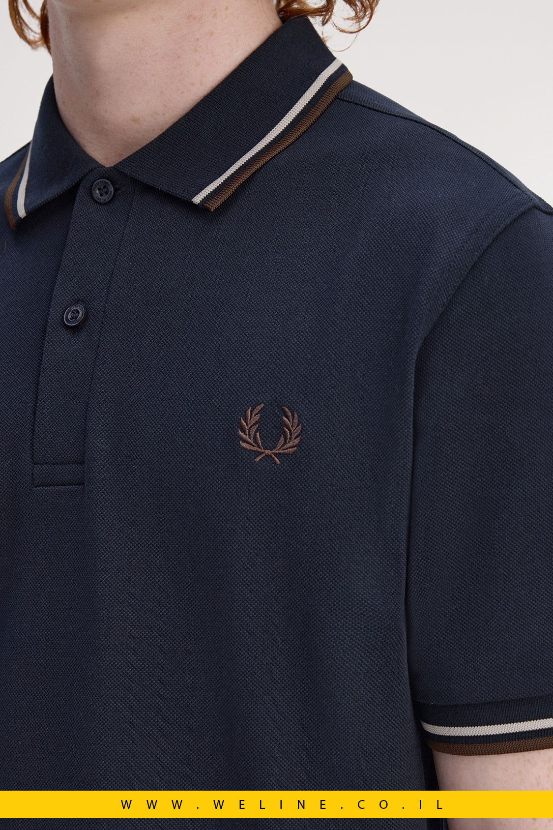 חולצת הפולו האייקונית דגם ה־Twin Tipped - The Fred Perry Shirt - WELINE.CO.IL